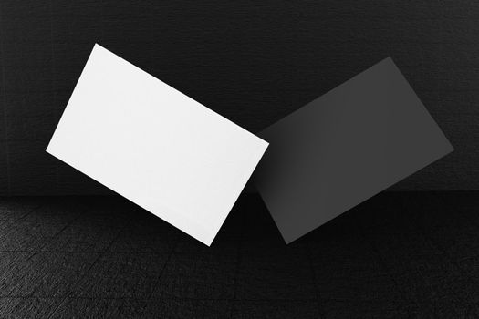 Black and white business card paper mockup template with blank space cover for insert company logo or personal identity on black concrete floor background. Modern concept. 3D illustration render