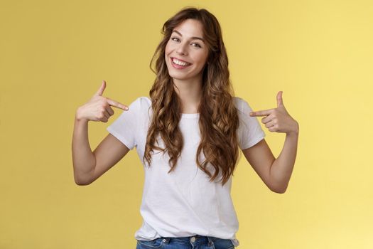 If you want professional its me. Sassy good-looking confident outgoing young woman introduce herself bragging own accomplishments pointing her chest smiling satisfied yellow background