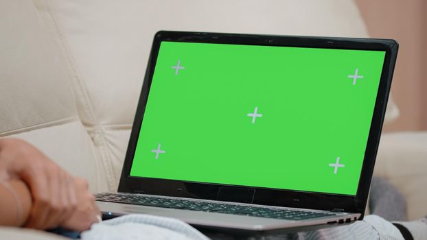 Close up of horizontal green screen on laptop