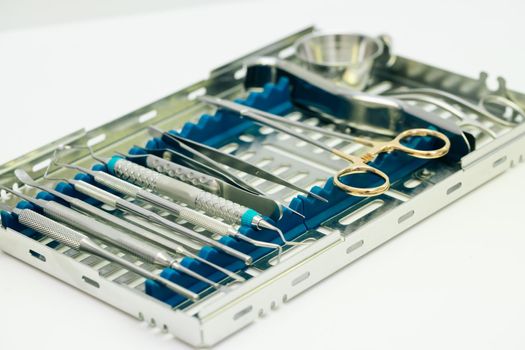 Dental implantation surgical set. Surgical kit of instruments used in dental implantology. Dentist orthopedist tools.