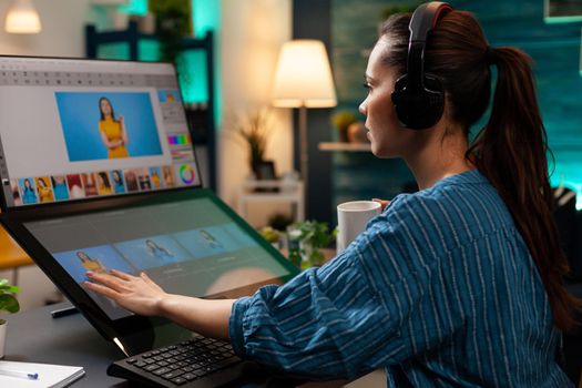 Woman with editor occupation wearing headphones