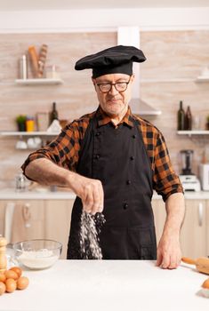 Senior chef in home kitchen