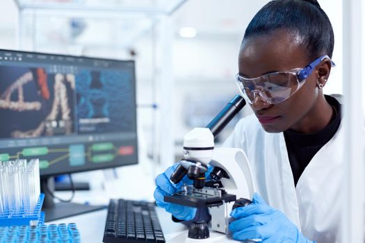 African pharmacology researcher analysing chemical substance
