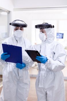 Doctor personal in ppe suit during globald pandemic