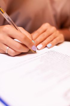 Close up of woman writing