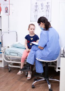 Nurse consulting child