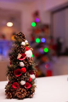 Close up of christmas tree in festive kitchen organized for winter