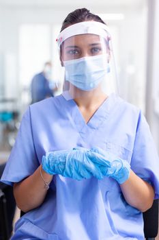 Medical assistant with visor and face mask