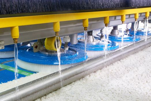 Automatic industrial line for washing and cleaning carpets