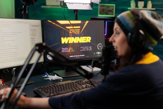Streamer woman winning virtual videogame competition