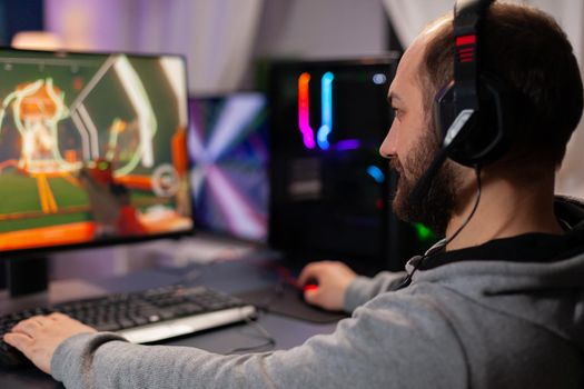 Digital player wearing headphones playing videogame