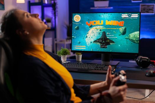 Gamer winning space shooter online tournament