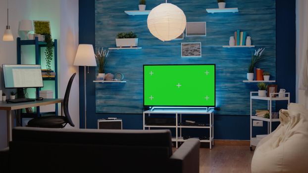 Nobody in living room with green screen display