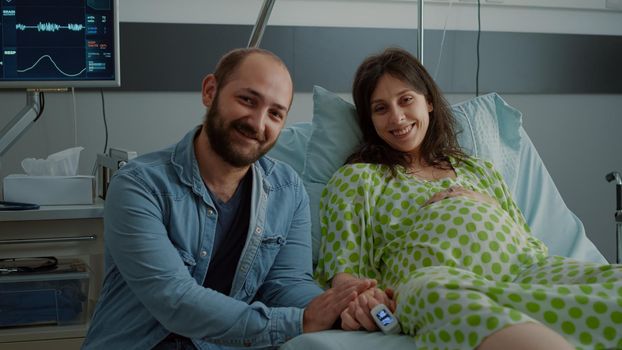 Caucasian couple waiting for child delivery in maternity ward