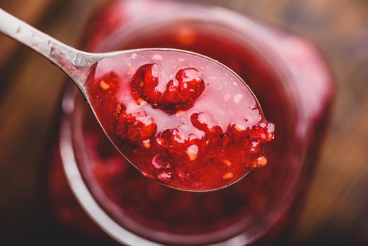 Spoonful of homemade raspberry jam