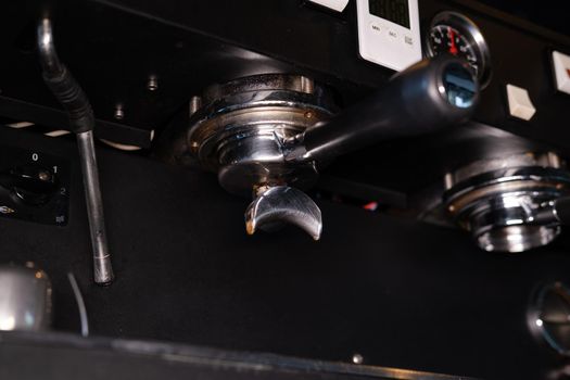 close up of a professional coffee machine. loft dark coffee shop