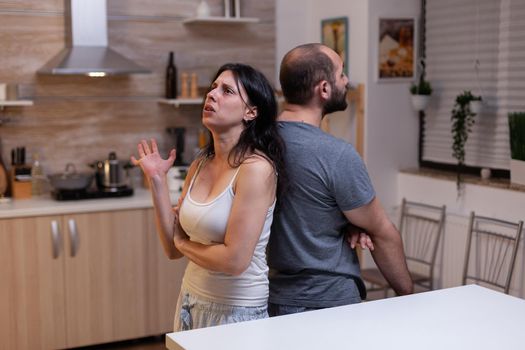 Man and woman in couple arguing about marriage problems