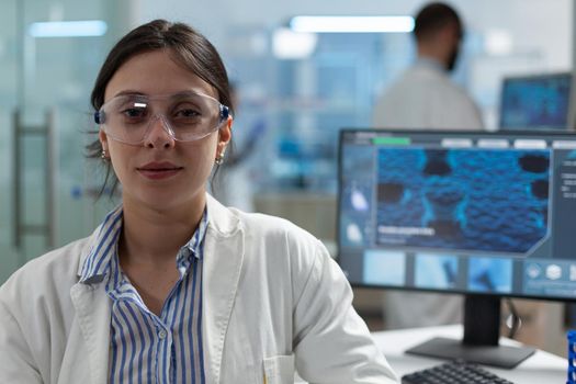 Portrait of scientist biochemist woman working at biochemistry medicament expertise