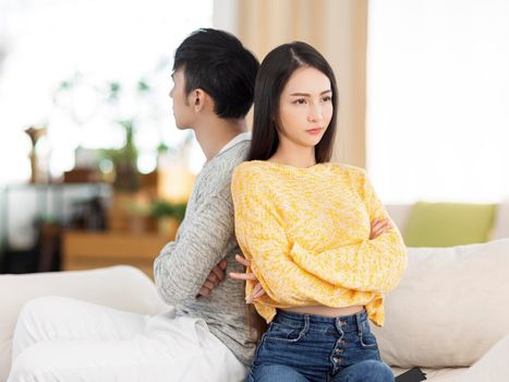 Young couple being in quarrel and not talking