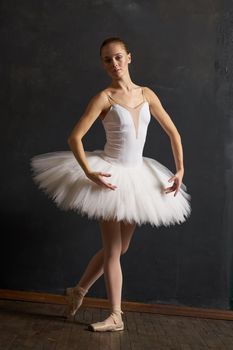 woman ballerina in white tutu performance grace dance