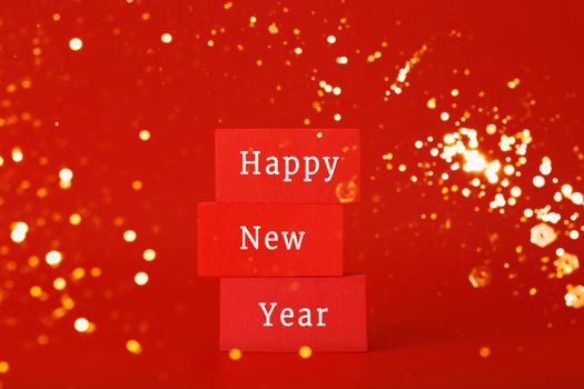 Happy New Year 2022 red elegant minimal concept on red background with bokeh