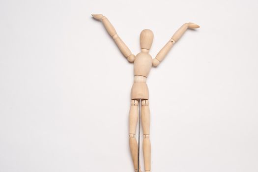 wooden mannequin object light background posing toy