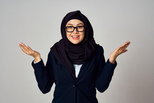 woman in black hijab laptop work technology office