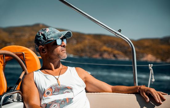 Man Relaxing on Sailboat