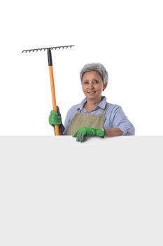Woman gardener with blank banner