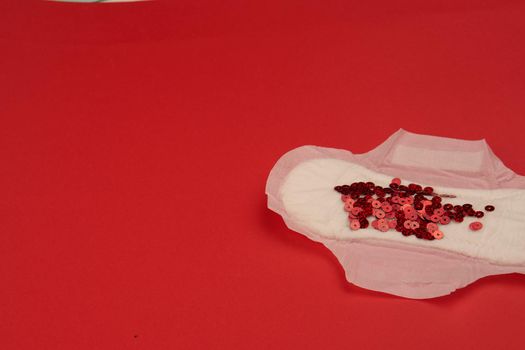 feminine pad blood menstruation hygiene red background