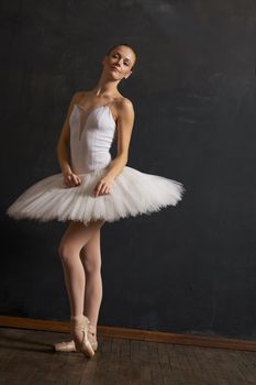 woman ballerina in white tutu performance grace dance