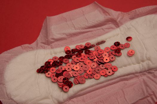 feminine pad blood menstruation hygiene red background