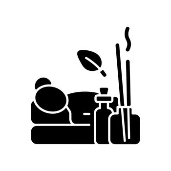 Aromatherapy massage black glyph icon