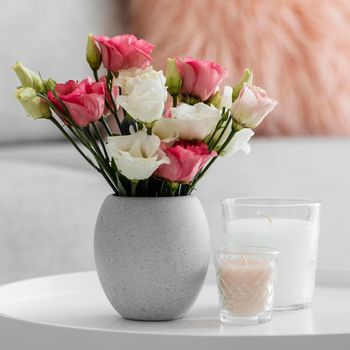 bouquet roses vase candles. High quality photo