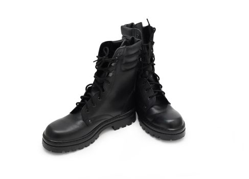 Pair of black military boots isolated on white background