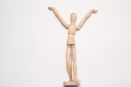 wooden mannequin object light background posing toy
