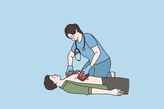 Female nurse use defibrillator for cardiac arrest