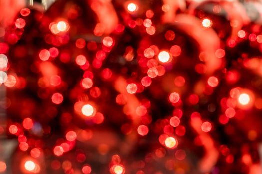 Abstract defocused blurred background. Festive background.red and white bokeh , christmas and happy new year banner. ad or postcard