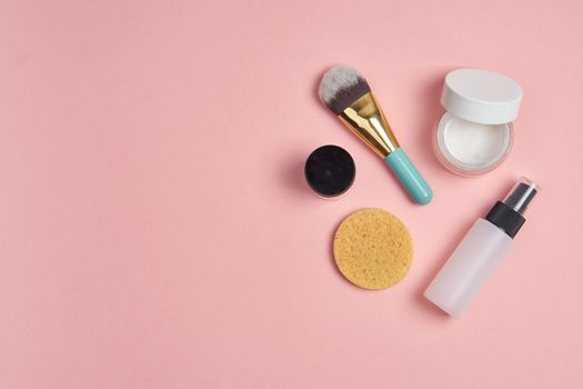 hygiene items skin care aromatherapy pink background