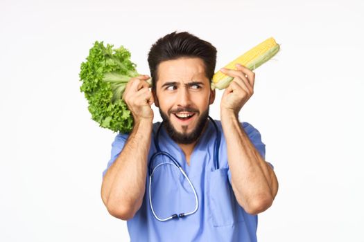 male nutritionist with vegetables in the hands of health calories