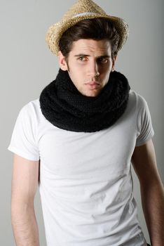 Handsome man wearing hat and scarf