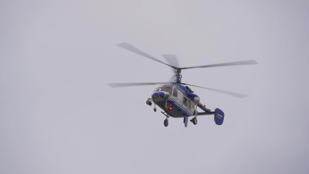 Police hellicopter flying in Russia sky