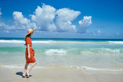 woman on the island beach ocean fresh air sand. High quality photo