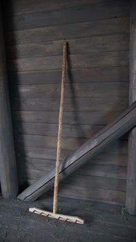 Ancient wooden rake in the shed