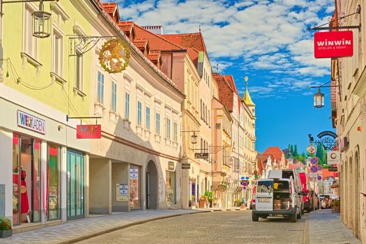 Steyr - June 2020, Austria: A cozy street with beautiful colorful buildings in the traditional architectural style