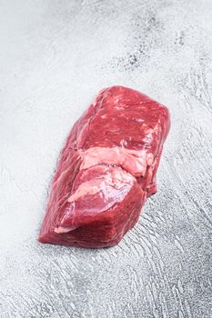 Raw veal meat steak fillet. White background. Top view. Copy space