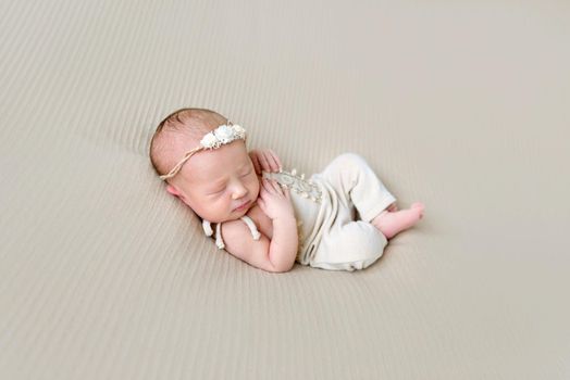 Baby girl wearing lovely costume sleeping