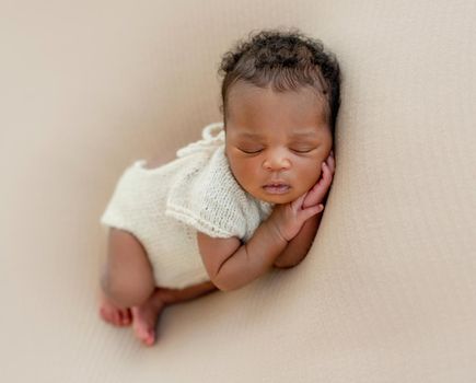 Innocent African newborn asleep