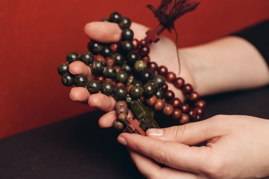 beads with orthodox cross meditation religion catholicism close-up