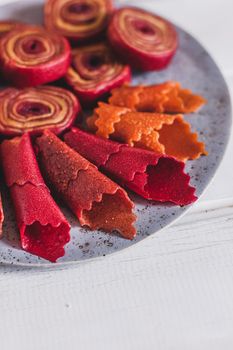 Fruit rolls pastille. Apple candy rolls, chips. Shredded and dried fruits. Useful sweetness. Food dessert. Homemade snack. Degidrated fruits. Natural and healthy, Sugar-Free, nutrition